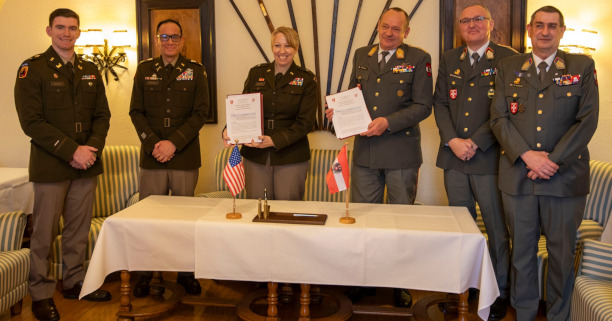 BG Tracy Poirier '96 (third from left) at Theresian Military Academy where she, representing Norwich University, and Austrian counterparts signed an agreement establishing a student exchange program for cadets.