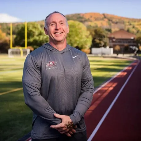 Director of Strength and Conditioning Scott Caulfield standing on Sabine Field