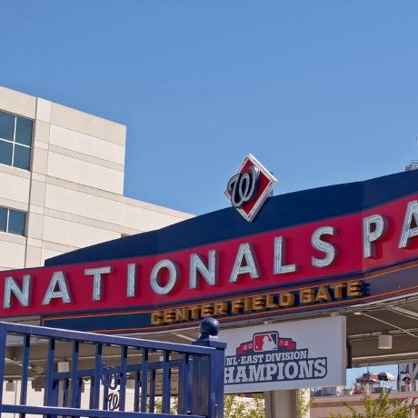Entrance gate with sign: Nationals Pa. - center field gate. "center field main gate - Washington Nationals Park - 2013-09-17" by Tim Evanson is licensed under CC BY-SA 2.0.