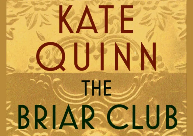 Book cover text of The Briar Club by Kate Quinn, a gold floral background.
