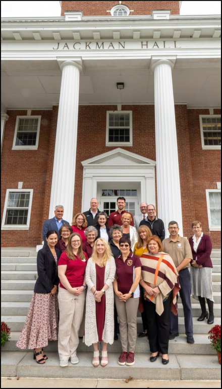 Group photo of Development and Alumni Relations staff, in front of the entrance of Jackman Hall, Sept. 2025