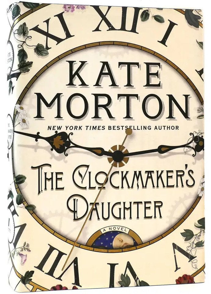 Image of clock with roman numerals, with book title text: Kate Morton - The Clockmaker's Daughter